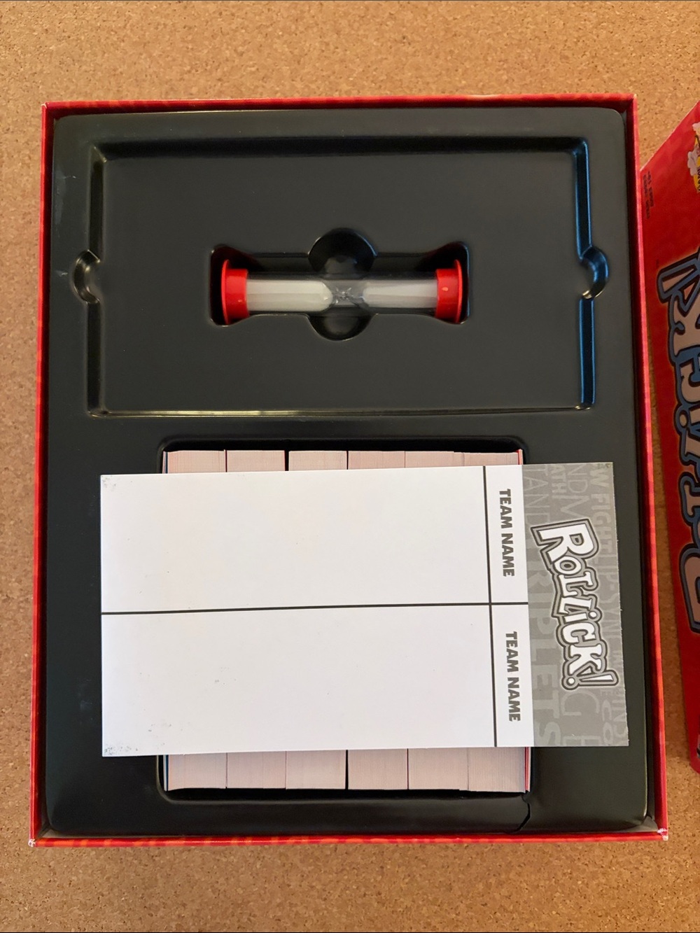 Rollick! Party Game by — Red Box with Blue, Yellow & Green Masks - Picture 6 of 6